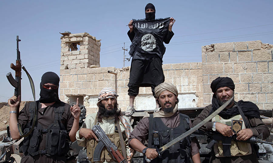 Islamic State Militants Patrol Syrian Border
