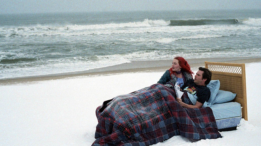 FILE - In this undated promotional file photo released by Focus Features, actors Kate Winslet, left, and Jim Carrey are seen in a scene from the film "Eternal Sunshine of the Spotless Mind." (AP Photo/Focus Features, David Lee, File)